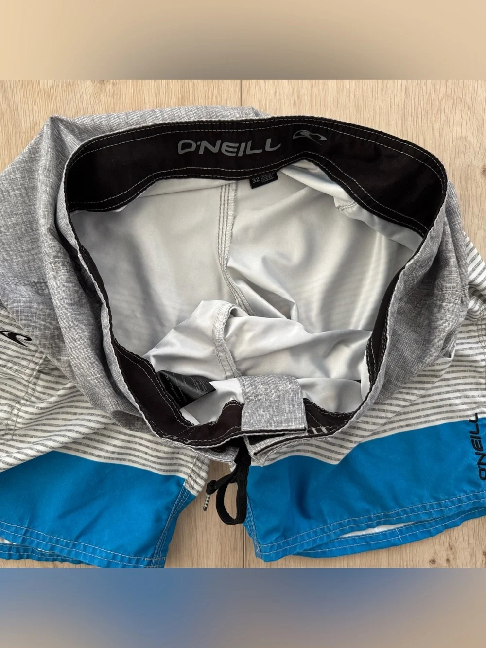 Mens O’Neill gray blue stripe board shorts surf swim trunks size 32 unlined